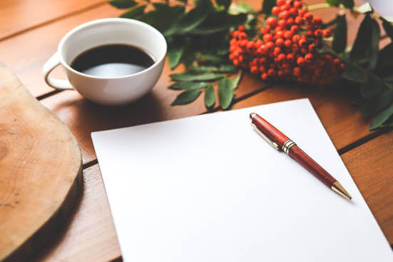 coffee-notepad-and-pen-on-table
