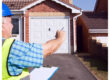 Probate property valuation with surveyor assessing house value.