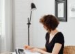 Executor reviewing estate financial documents and debts.