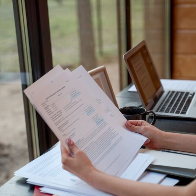 Executor Resigning Executor reviewing a will and probate documents before stepping down.