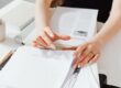 Person reviewing estate documents to determine whether probate is required.