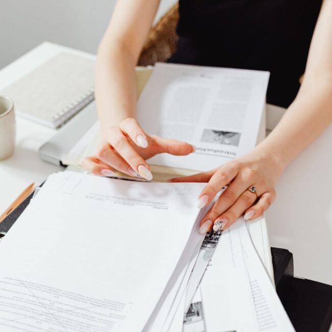 Person reviewing estate documents to determine whether probate is required.